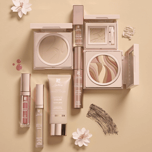 Produkte kozmetike BioNike për mbulim dhe kujdes të lëkurës, përfshirë concealer dhe produkte.