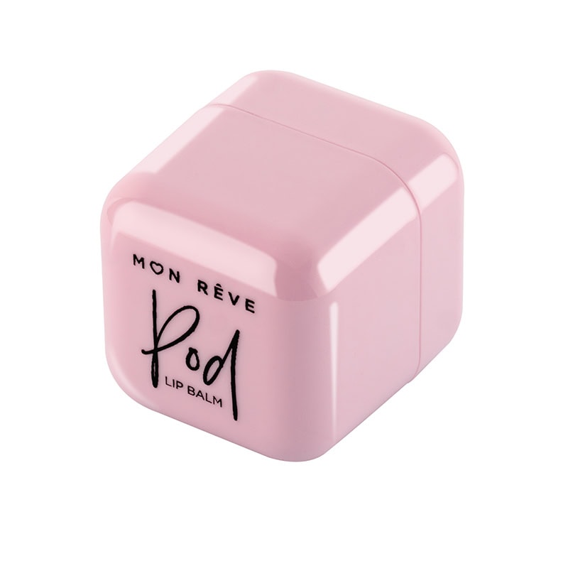 Pink lip balm container Mon Rêve Pod për buzë me ngjyrë rozë dhe dizajn modern.