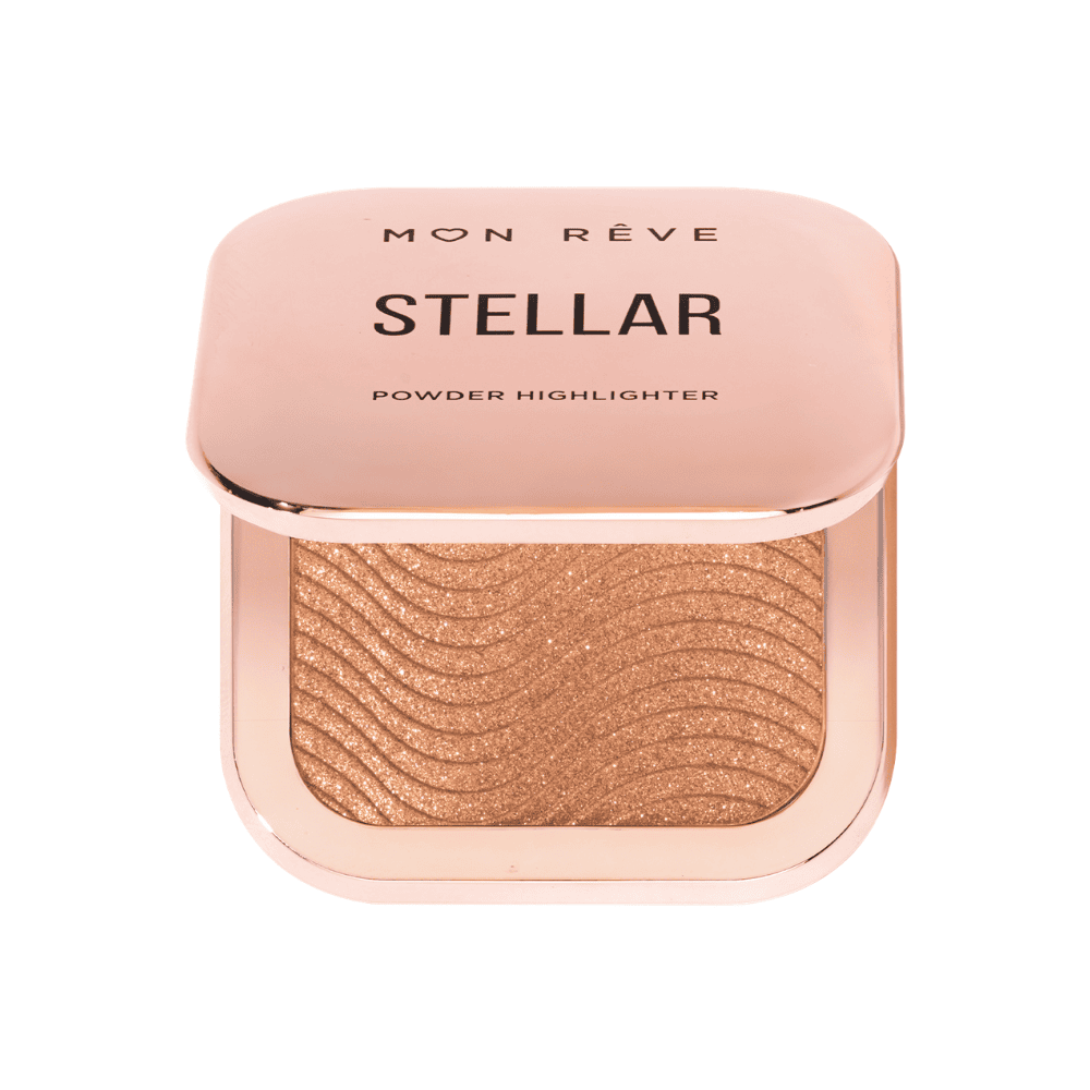 Stellar highlighter me ngjyrë ari të ndezur për shkëlqim natyral dhe tërheqës.