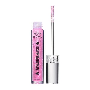 Lip oil Starflake nga Mon Reve, ngjyrë rozë shkëlqim dhe shkume të vogla shkëlqimi në paketim.