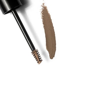 Qepje me zbardhje kozmetike, avull eyeliner ngjyra kafe e mbylle me brush.